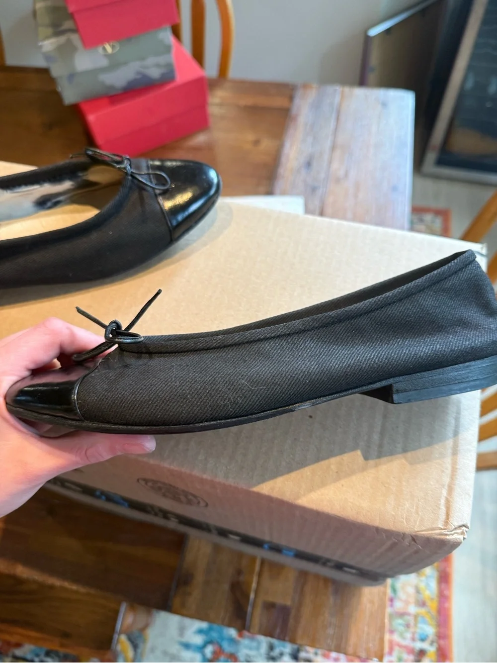 CHANEL Black Cap-Toe Ballet Flats with Bow